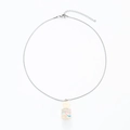 Macro view of silver snake chain with transparent drift bottle pendant and colorful sequins - Stainless Steel Apricot