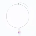 Close-up of silver chain necklace with a mini glass bottle pendant filled with purple stars - Stainless Steel Purple