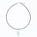 Detail of drift bottle necklace with blue star sequins and black wax cord closure - Cord Blue