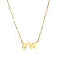 Nahaufnahme des Schreibschrift-Y und Schmetterling-Anhängers an einer 18K Goldkette - Buchstabe Y