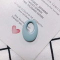 Macro detail of a light blue oval resin pendant with central hole on a decorative card - Light Blue (1#)