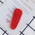 Handmade red knitted hair clip in water-drop shape on white card background - True Red