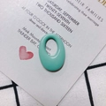 Close-up of mint green oval resin pendant with hollow center and smooth jelly texture - Mint Green (2#)