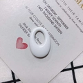 Detailed close-up of white oval resin pendant components with a high-polished ceramic finish - White (7#)