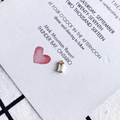 Detail shot of a rectangular crystal pendant with gold plating on a wedding invite card - Transparent (10)