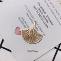 Macro detail of a 35x33mm fan-shaped gold ginkgo leaf pendant for DIY jewelry making - Gold Ginkgo Leaf Hollow Pendant (7)