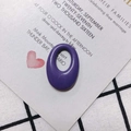 Close-up of a smooth purple oval resin charm on a vintage invitation card for DIY jewelry - Deep Purple (12#)