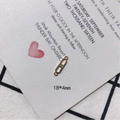 Macro detail of a 18x4mm golden metal rectangle charm connector with double loop hooks - Gold Double C Hollow Pendant Clasp (19)