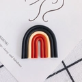 Macro view of a colorful rainbow clay pendant charm for DIY jewelry making accessories - Black Beige Orange Red Four-Color Soft Clay Style (16#)