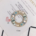Detailed view of 41mm owl acrylic pendant bead for DIY jewelry making and accessories - Brown Round Owl Style