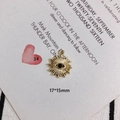 Detailansicht eines Evil-Eye-Sonnenanhängers für DIY-Schmuck, 17x15mm aus goldener Legierung - Sonnenstrahl Böser Blick (3#)