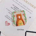 Detail of a square acrylic cartoon bear charm with 40x38mm size for DIY crafts - Cartoon Bear Square Style
