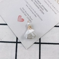 Close-up of elegant white fabric flower charm with pearl detail and golden metal hook - 5# White