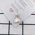Macro view of white fabric flower petal pendant with pearl and gold hollow filigree cap - 12# White Satin