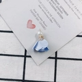Detail of light blue fabric flower pendant with faux pearl and gold metal floral cap - Light Blue