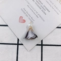 Close-up of elegant grey fabric flower pendant with a white pearl and gold filigree cap - 19# Gray Satin