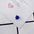Close-up of a blue star-shaped glass bead with colorful details for DIY jewelry making - Blue Star Style (1#)