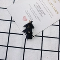 Détail d'un pendentif fleur DIY avec couches de mousseline noire et calotte dorée - Style Mousseline Noir (20#)