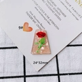 Detailed close-up of marble pattern acrylic pendant with rose floral print 24x32mm - Red Rose Trapezoid Pendant (9#)