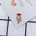 Macro detail of gold DIY jewelry pendant with red pear-cut stones and white crystals - Red Gemstone Peacock Style (2#)