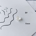 Macro shot of 11mm white acrylic flower DIY jewelry component on a minimalist card - Stereo Textured Flower (8#)