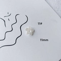 Detail view of 11mm white acrylic five-petal flower bead for DIY jewelry making - Shell Texture Five-petal Flower (11#)