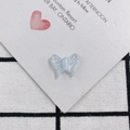 Macro detail of iridescent blue acrylic butterfly charm with shimmering aurora powder - Iridescent Light Blue (7)