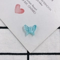 Detail of light blue resin butterfly charm with glitter for DIY earring making - Ice Translucent Light Blue (8)