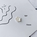 Macro shot of 11mm white acrylic flower charm with pearl luster for DIY jewelry making - Five-petal Flower Grooved (16#)