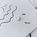 Detail shot of 10mm white acrylic daisy beads for DIY jewelry making and crafts - Little Daisy Shape (19#)