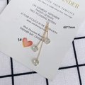 Detail of 60mm gold tassel earrings with three chains and sparkling round cubic zirconia - Gold Round Tassel Style (1#)