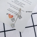Detail view of 62x10mm long tassel earrings with light blue star-shaped zircon in silver - Silver Clover Tassel Style (2#)