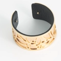 Hollow butterfly cuff bracelet in golden metal with black textured leather lining - Gold