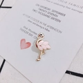 Detailed macro shot of pink flamingo pendant with gold alloy plating and enamel finish - Pink (Right)