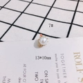 Detail view of 13x10mm round pearl pendant with golden sunburst metal base and top loop - 13x10mm Flower Edge Pearl Pendant (7#)