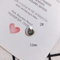 Macro shot of 12mm teardrop-shaped shell pendant with iridescent mother-of-pearl texture - Teardrop Shape (2#) / 12mm