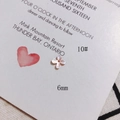 Macro shot of 6mm cross flower shaped natural shell bead with iridescent luster finish - Cross Flower Shape (10#)