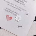 Detailed view of 14mm white carved shell flower bead with iridescent pearly finish - 14mm Lustrous 5-Petal Flower Style (9#)