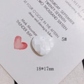 Macro detail of a 18x17mm heart-shaped pendant made of mosaic white mother of pearl tiles - Milky White Heart Shell Splicing (5#)