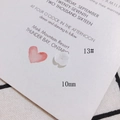 Vue macro d'une fleur de nacre sculptée de 10mm pour accessoire bijoux DIY avec éclat nacré - Fleur blanc nacré 10mm (13#)