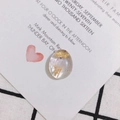 Detail of oval acrylic pendant with purple dried flowers and gold foil accents - Lavender Flower Style (3#)