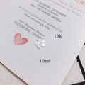 Vue macro détaillée de la fleur en nacre blanche de 10mm pour la création de bijoux DIY - Perle de fleur irisée 10mm (19#)