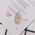 Detail of 30x15mm golden geometric oval charm with circular cutouts for DIY jewelry - Geometric Circle Stacked Style (6#)
