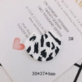 Macro detail of fan-shaped earring pendant with black spots and 30x37x4mm dimensions - Zebra Print Fan (3#)