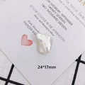 Macro shot of 24x17mm baroque faux pearl charm with bow detail for DIY jewelry making - Irregular Baroque Pendant (7)
