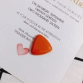 Detailed close-up of a polished orange triangular resin cabochon for jewelry making - 8# Orange