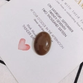 Gros plan d'un cabochon ovale en agate brune polie pour bijoux DIY et accessoires déco - 1# Brun Foncé
