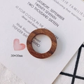 Close-up of 30mm dark brown geometric round wooden hoop for DIY earring making - Round Wood Ring (1#)