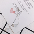 Close-up of silver clover pendant with cat-eye stone beads and long fringe chain - Silver Flower Clover Tassel Style (5#)