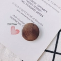 Macro detail of a 25mm round dark brown wooden pendant showing natural wood grain texture - Solid Round Pendant (5#)